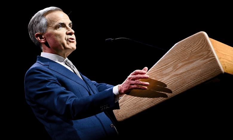 Canadian Prime Minister Carney speaking at a podium during a political event.