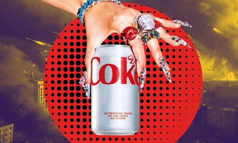 Close-up of a hand holding a Diet Coke can with colourful, decorated nails against a dramatic cityscape b.