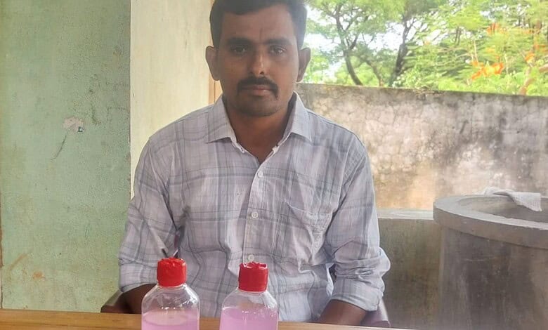 A Telangana forest beat officer is seen in custody after landing in ACB net, related to corruption allega.