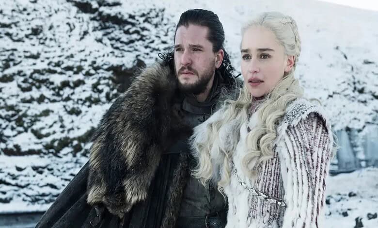 Image from Game of Thrones featuring Daenerys Targaryen and Jon Snow in a snowy landscape.