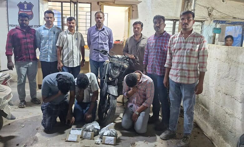 Arrested suspects with seized ganja in Rangareddy, police showcase the drug bust and apprehended individu.