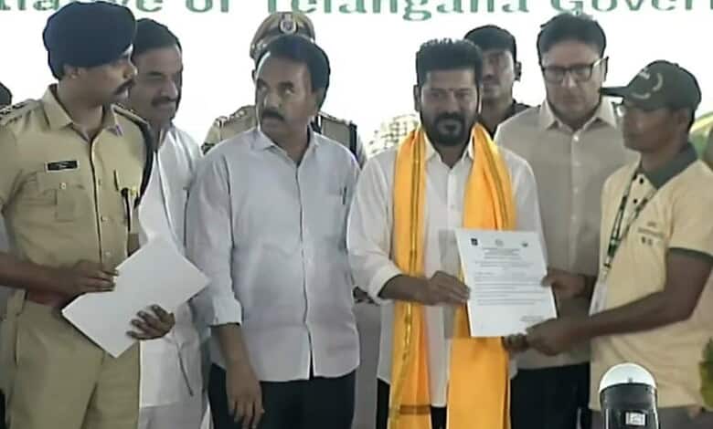 The image shows Chief Minister A Revanth Reddy handing over the Giri Darshak training certificate to one of the former Maoists at an official programme held in Future City on Tuesday, April 28, 2026.
