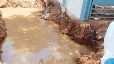 The image shows the pit that was dug by Mission Bhagiratha officials to repair a pipeline in Alimpur village of Jangaon district, which became the death trap for a five-year-old girl who drowned in it and died on Thursday, April 30, 2026.