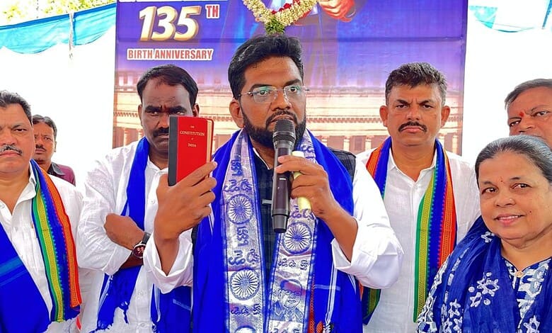 The image shows Hyderabad DCC President Syed Khalid Saifullah addressing the Ambedkar Jayanthi celebrations held in Hyderabad's Old City on Tuesday, April 14, 2026.