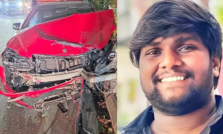 Accident scene showing a damaged red car after hitting a man on Durgam Cheruvu cable bridge, driver fleei.