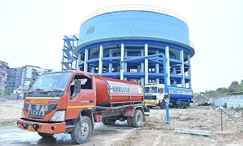 Water tanker truck delivering water at HMWSSB water treatment plant.