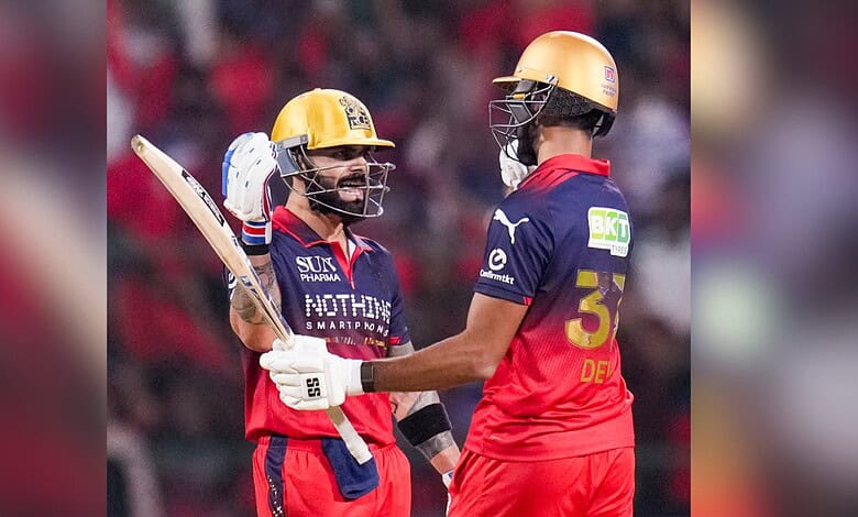 Royal Challengers Bengaluru's Devdutt Padikkal (right) celebrates his half century with Virat Kohli during the IPL match between Royal Challengers Bengaluru and Gujarat Titans, in Bengaluru, Karnataka, on Friday, April 24.