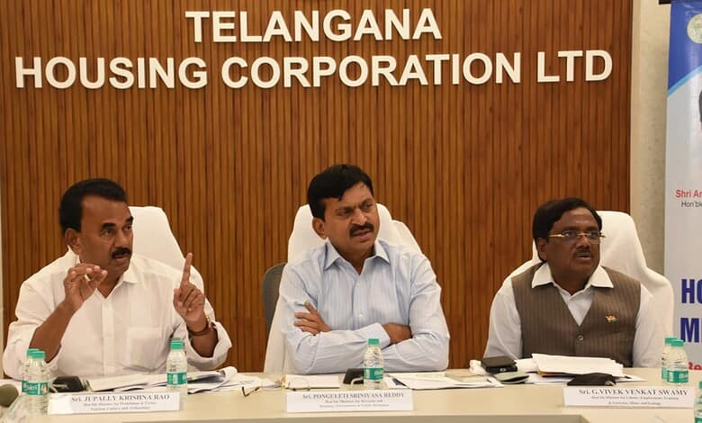 Telangana Housing Corporation LTD officials during a formal meeting at the conference room.