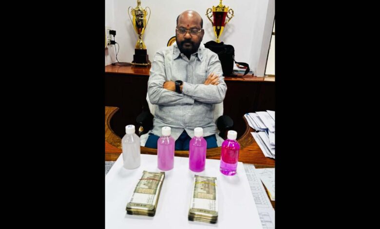 Dr M Goverdhan caught while taking a bribe