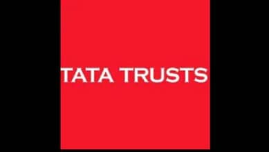 Tata Trusts logo on red background, symbolising the organisation's identity.