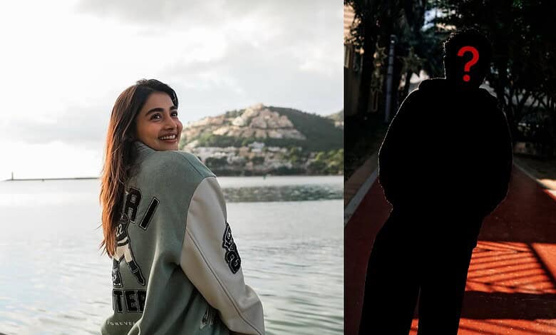 Pooja Hedge smiling by the water, with a shadowed figure of an actor in the background, hinting at their.