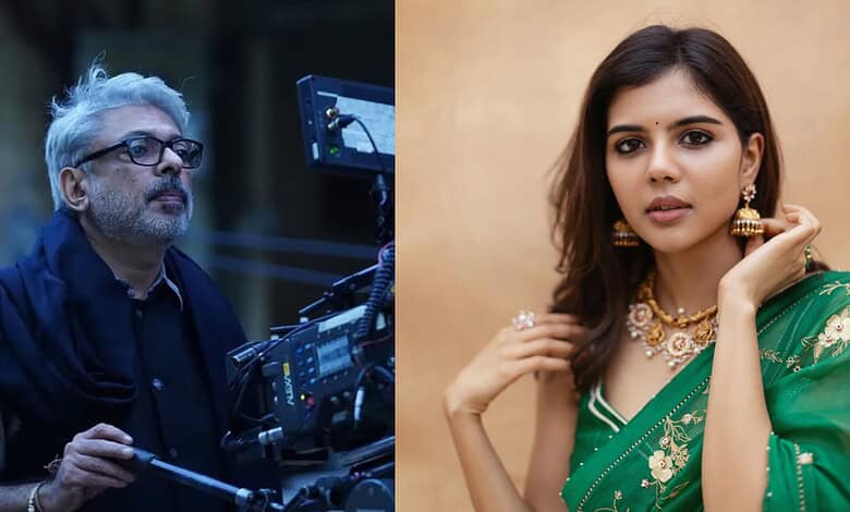 Kalyani Priyadarshan in traditional green saree with jewellery, on set for Madhubala biopic.