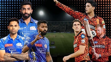 Mumbai Indians and Sunrisers Hyderabad players on the field during a tense cricket match.