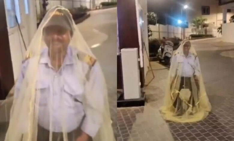 Security guard wears mosquito net