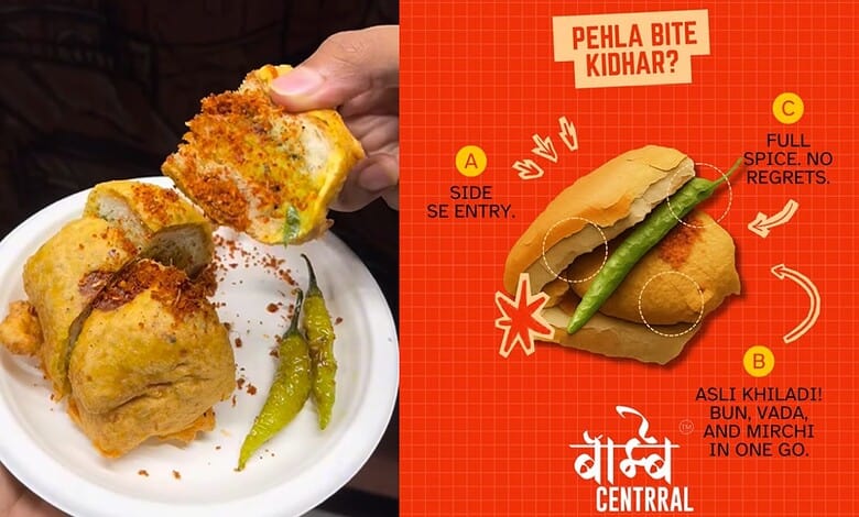 Close-up of a traditional vada pav served with green chilli, highlighting Hyderabad's authentic street fo.