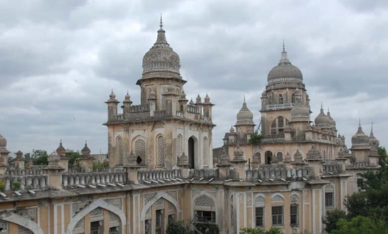 Osmania Hospital building in Hyderabad under cloudy sky.