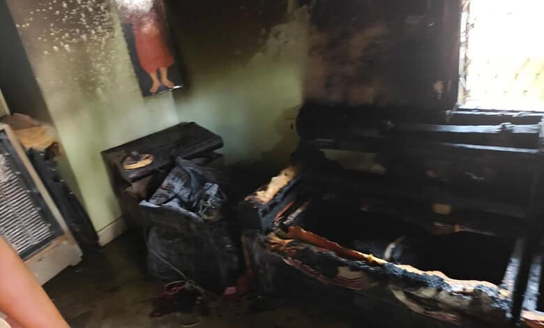 Fire damage to a sofa after a tragic incident during puja at Begumpet.
