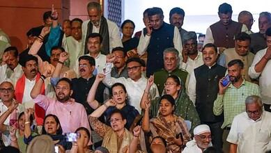 Group of protesters demonstrating against Women’s Reservation Bill at a nationwide NDA protest.