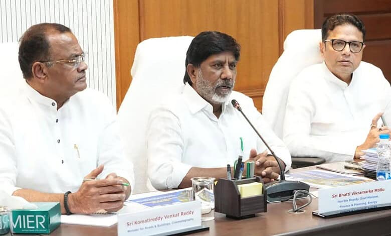 Officials seated at a conference table during a formal meeting.