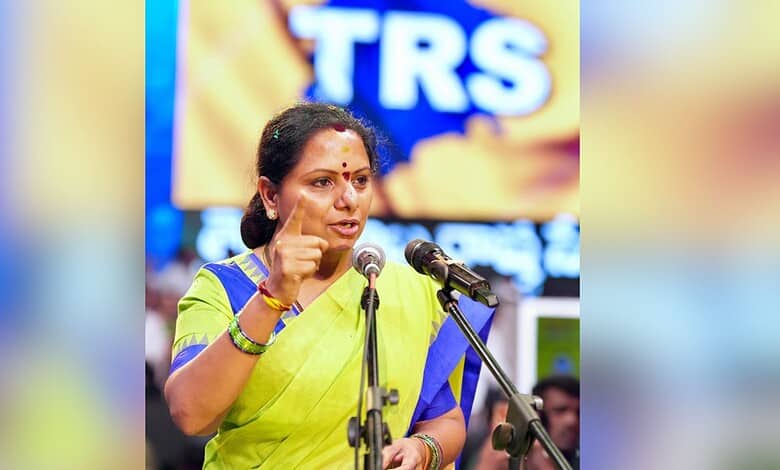 Indian woman politician addressing a crowd with a passionate gesture.