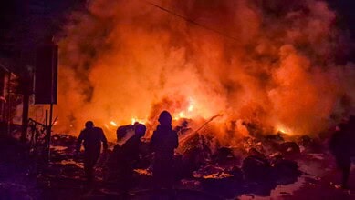 Fire fighters at work at the accident site in Rajasthan