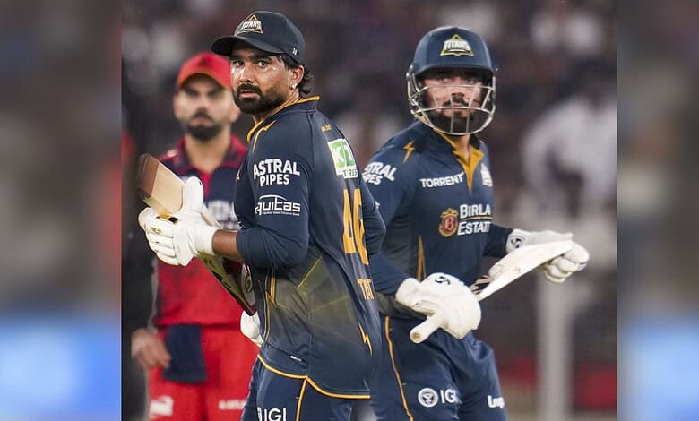 Gujarat Titans players celebrating after winning the match against Royal Challengers Bengaluru.