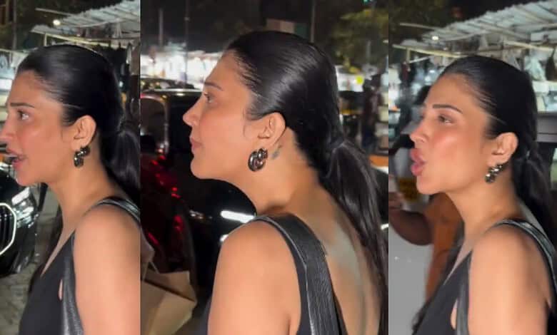 Shruti Haasan looks irritated with paparazzi at night, expressing her frustration during a public outing.