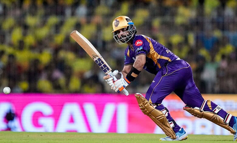 Kolkata Knight Riders cricketer in purple uniform batting during a match.