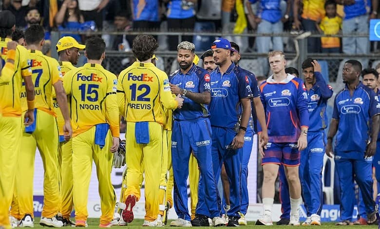 Sanju Samson and Akeal Hosein celebrate after CSK's 103-run win over MI in IPL.
