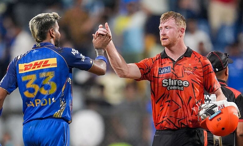 Klaasen and Head celebrate during IPL match, showcasing key players in a high-scoring chase.