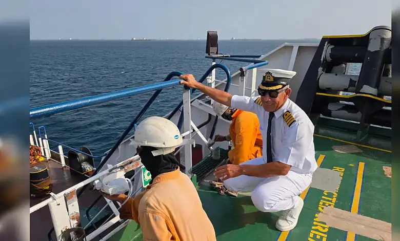Iraqi captain supervises crew on oil tanker deck in Gulf of Oman.
