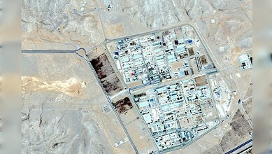 Aerial view of a nuclear facility in a desert area, highlighting the ongoing tensions between the US and.