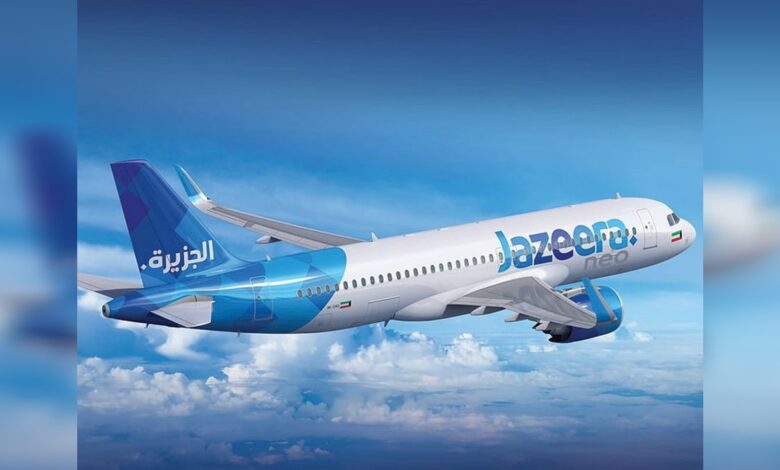 Jazeera Airways aircraft flying above clouds.