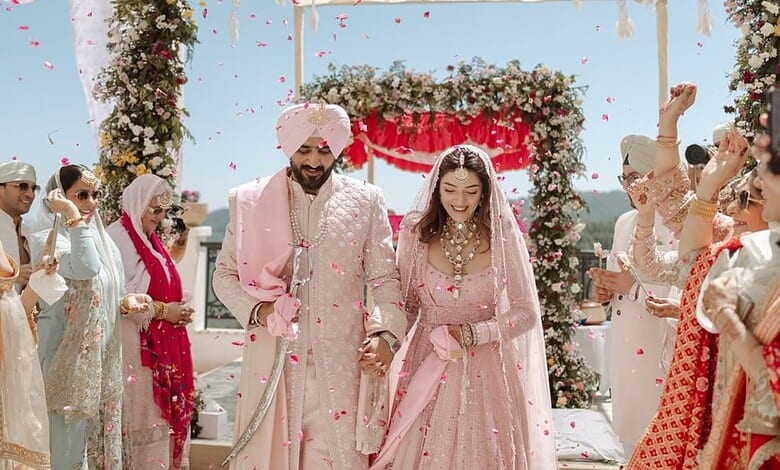 Actress Mehreen Pirzadaa in traditional Sikh wedding attire during her wedding celebration.