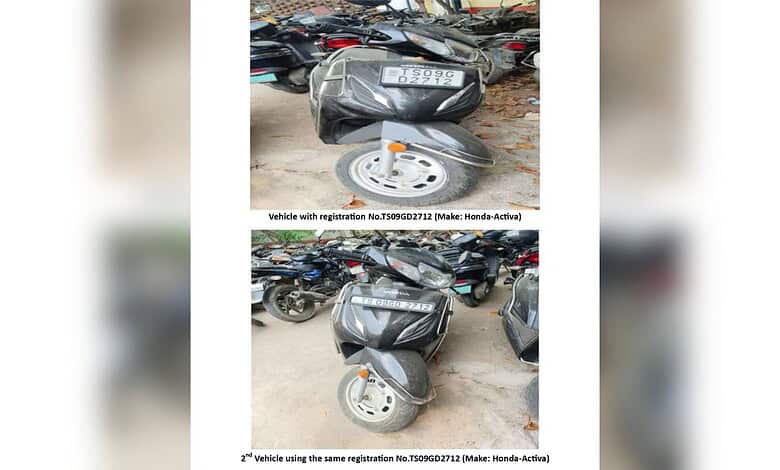An image showing a motorcycle with a fake registration plate, used by a man in Hyderabad to evade traffic.