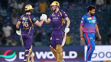 KKR players celebrate after winning against DC, with Allen scoring an unbeaten century in the cricket mat.