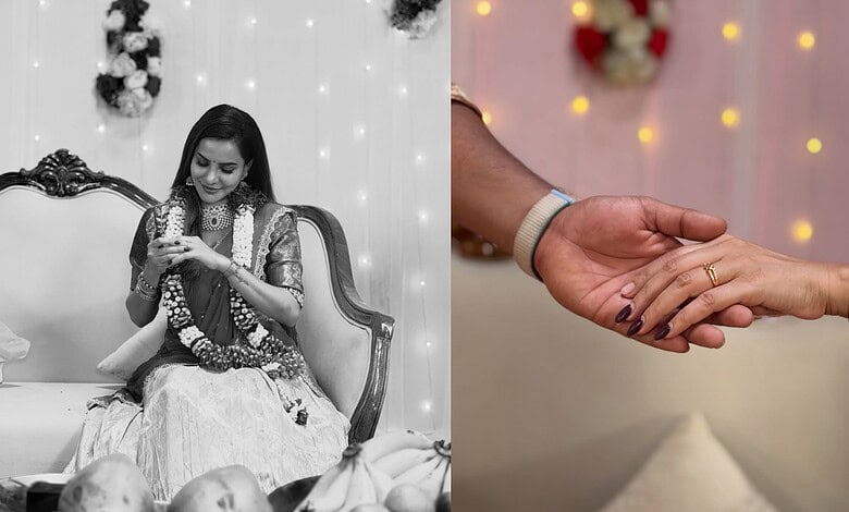 A young woman in traditional attire with a garland, sitting on a vintage sofa during an engagement celebr.