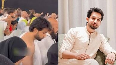 Bilal Abbas Khan during Haj pilgrimage in Saudi Arabia, taking a break amidst a large gathering.