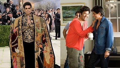 Karan Johar and Shah Rukh Khan sharing a joyful moment at the Met Gala, highlighting their close friendsh.