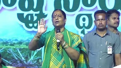 Konda Surekha making a speech during a political protest, with "Jai Shri Ram" coins raining from above, a.