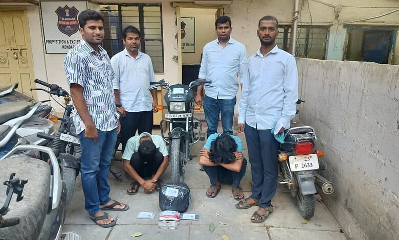 Youth group with motorcycles in an urban setting, India.