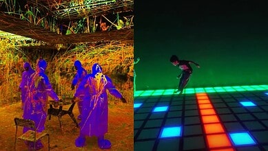 Diverse group of people enjoying outdoor night event with vibrant lighting and interactive digital dance.