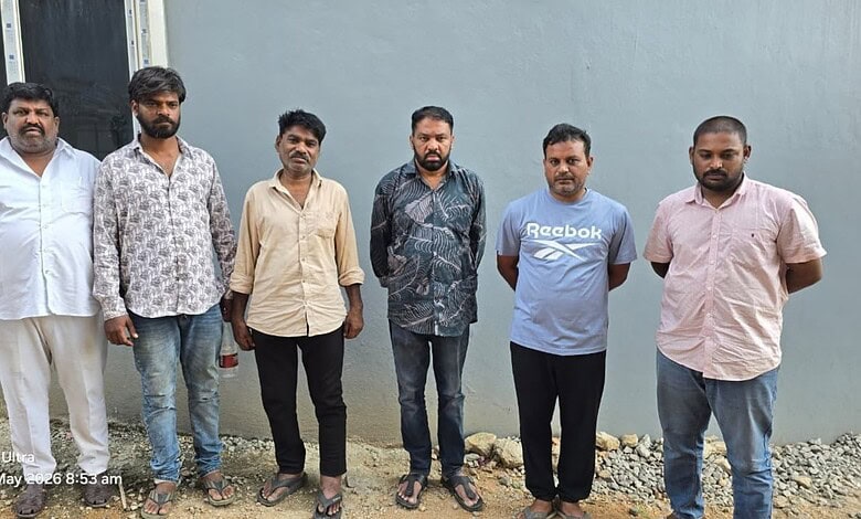 Victims of fake plot registration scam in Hyderabad, including a retired man, stand together after the bu.