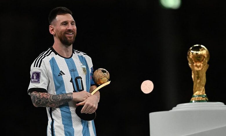 Argentina football team celebrating with trophy, Messi holding Ballon d'Or, during FIFA World Cup 2026.