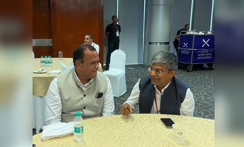 Officials discussing Hyderabad-Vijayawada Regional Ring Road project at a conference.
