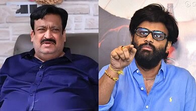 Two Indian men in casual attire, one with glasses and beard, the other with mustache, seated indoors.