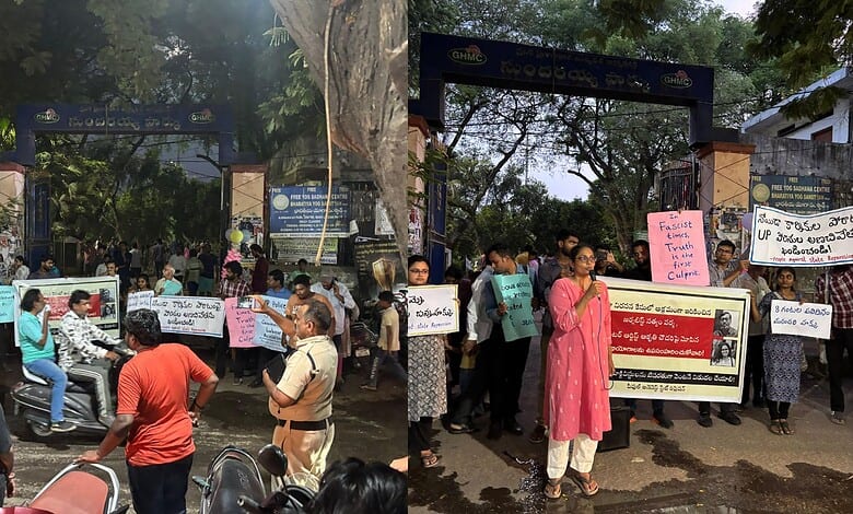 The Siasat Daily protest outside university with students holding signs and banners for educational right.
