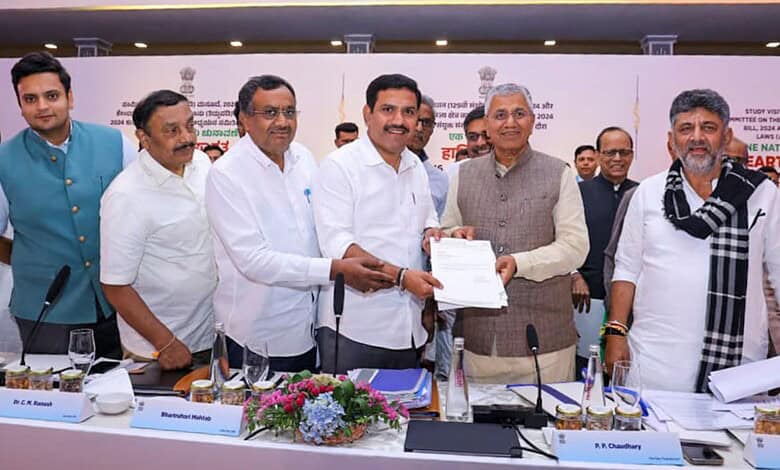 Prominent officials at a formal signing event, celebrating a partnership or agreement, with a decorated t.