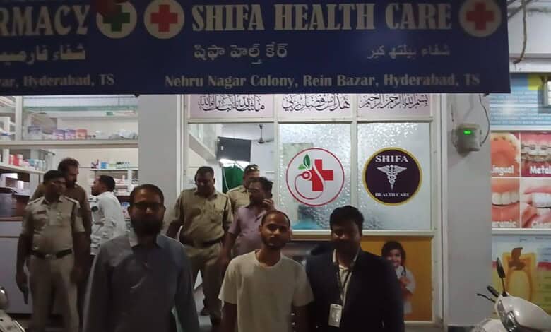 Affordable Shifa Health Care pharmacy in Hyderabad with staff and customers outside the store.