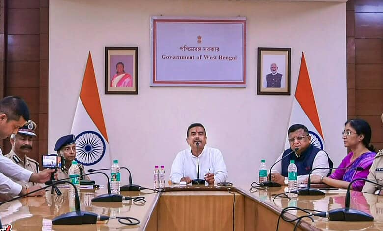 West Bengal Chief Minister Suvendu Adhikari, centre, addresses a press conference, in Howrah. (CMO via PTI Photo)